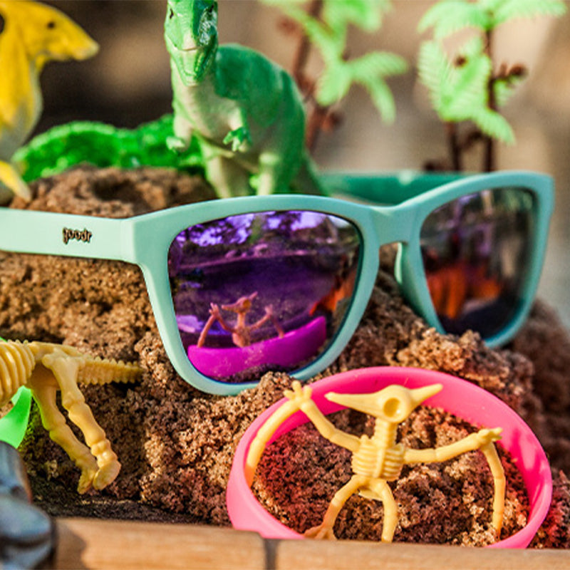 Teal and Purple Sunglasses - Electric Dinotopia Carnival Teal | Goodr